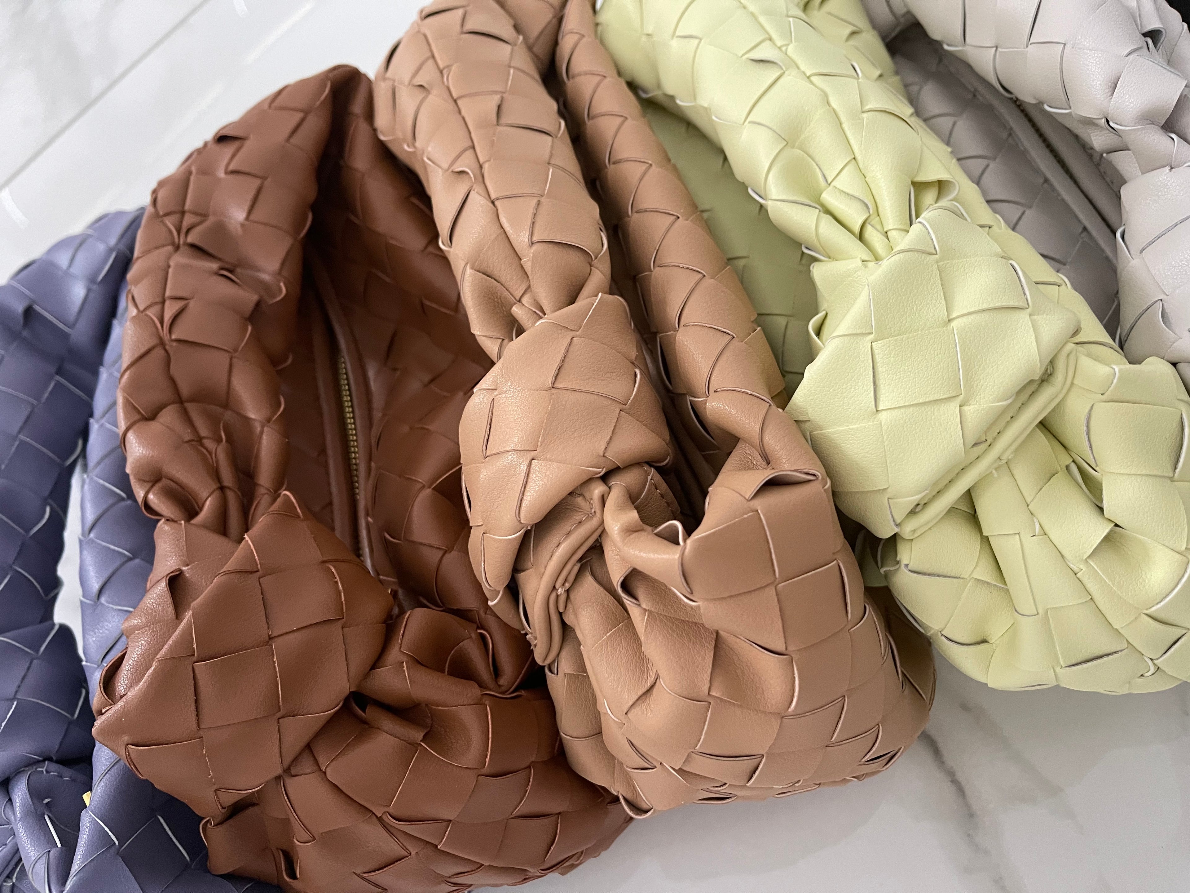 NEW IN WHITNEY fine weave leather Bag.
