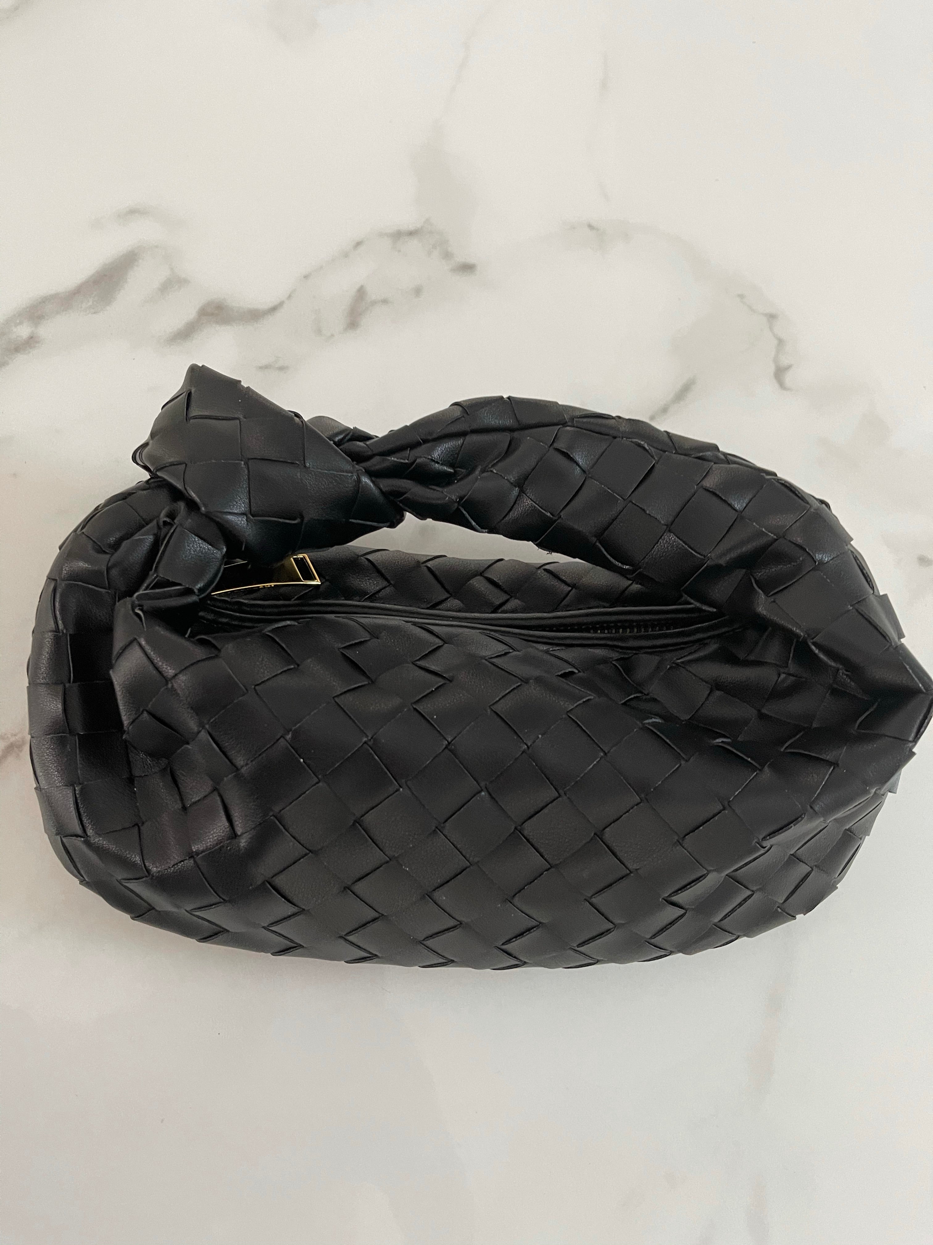 NEW IN WHITNEY fine weave leather Bag.