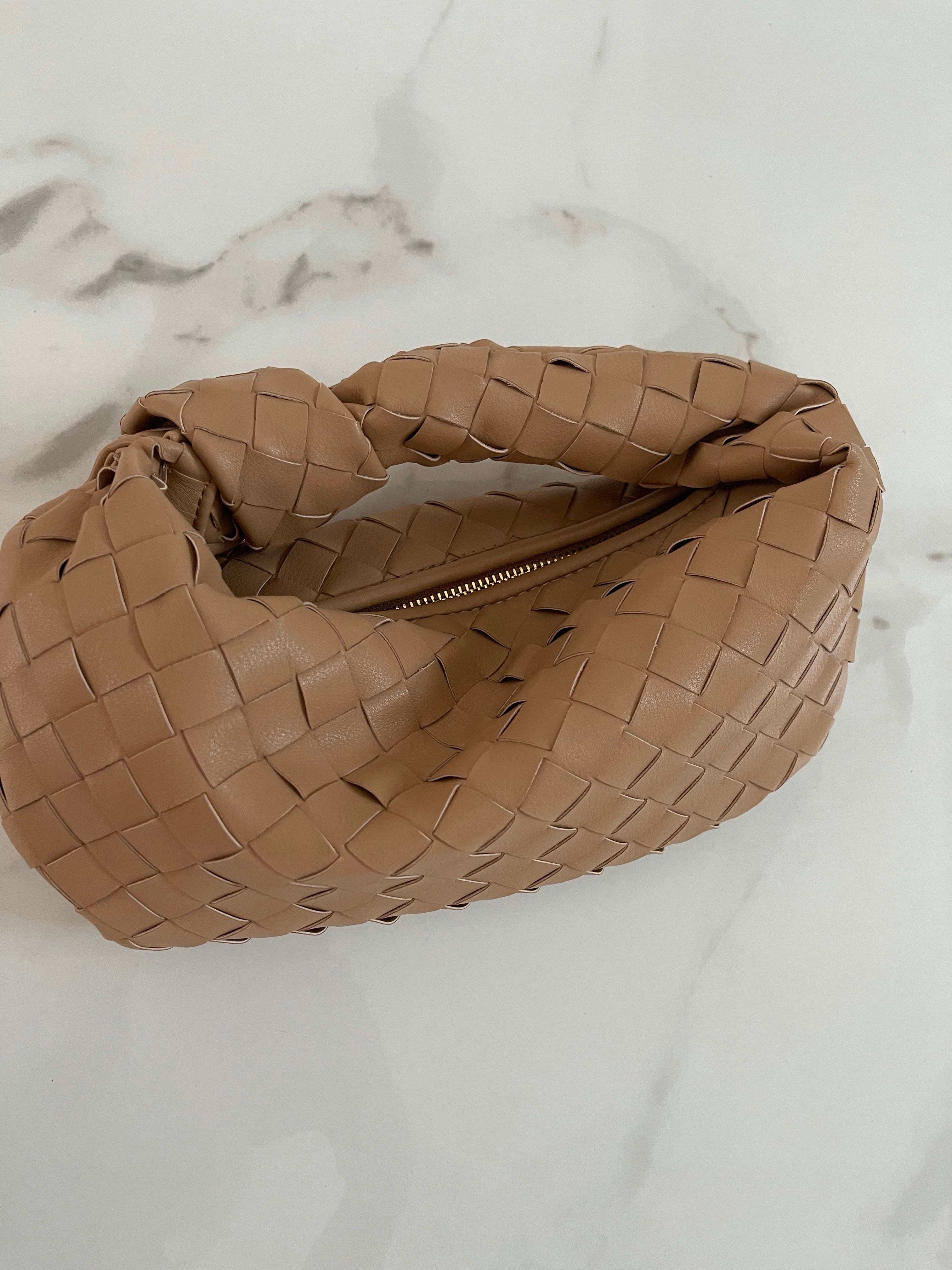 NEW IN WHITNEY fine weave leather Bag.