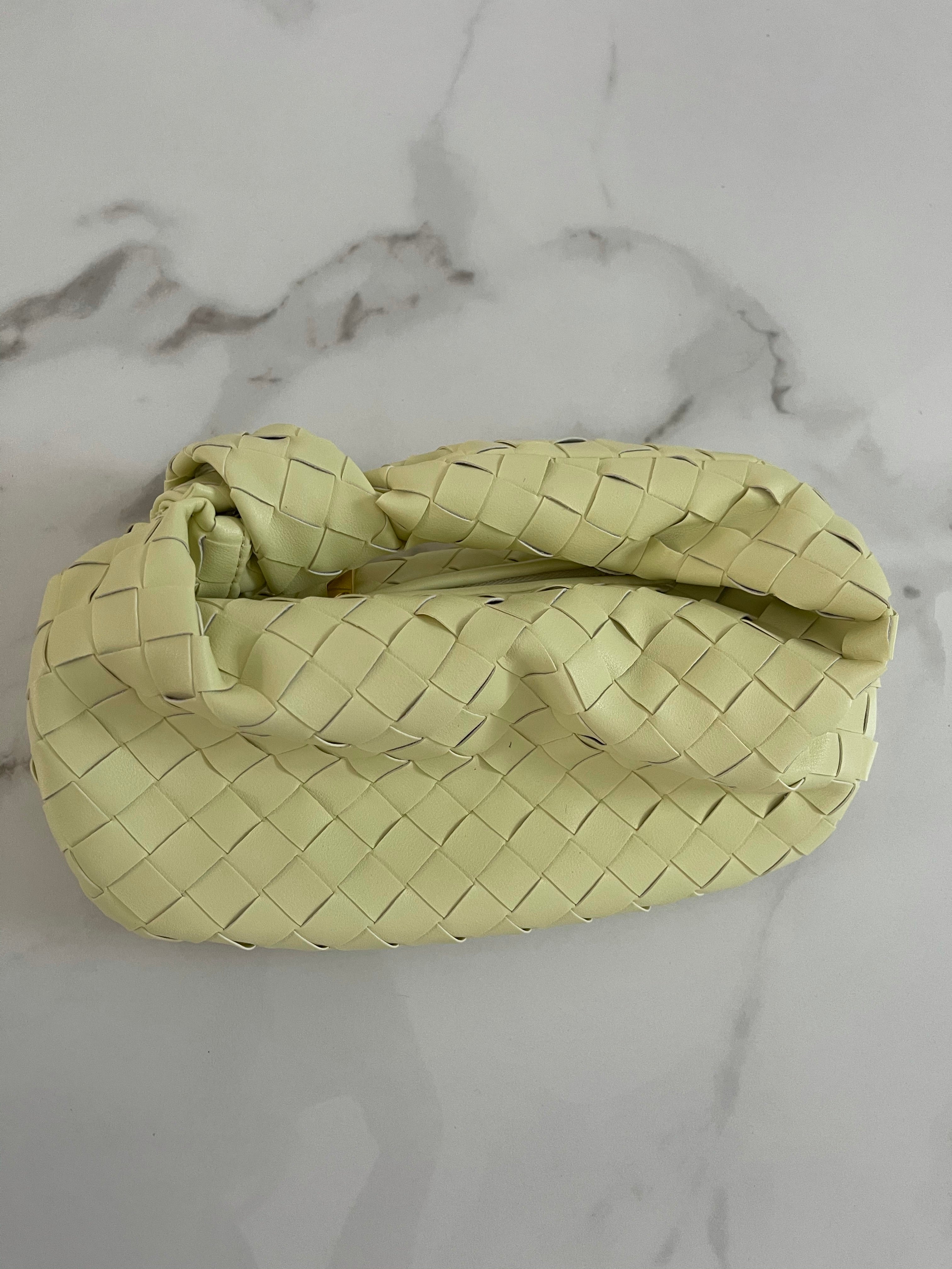 NEW IN WHITNEY fine weave leather Bag.