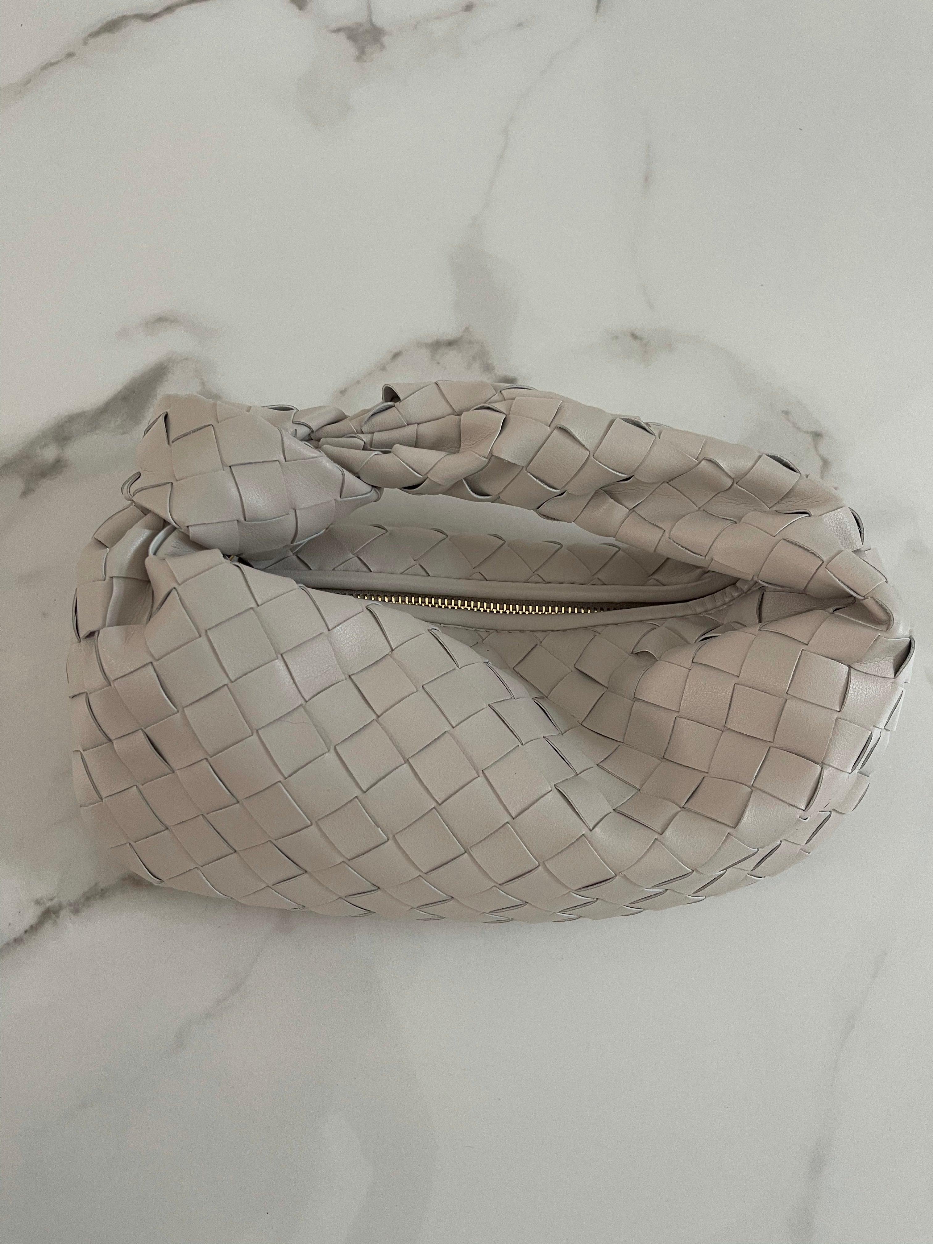NEW IN WHITNEY fine weave leather Bag.