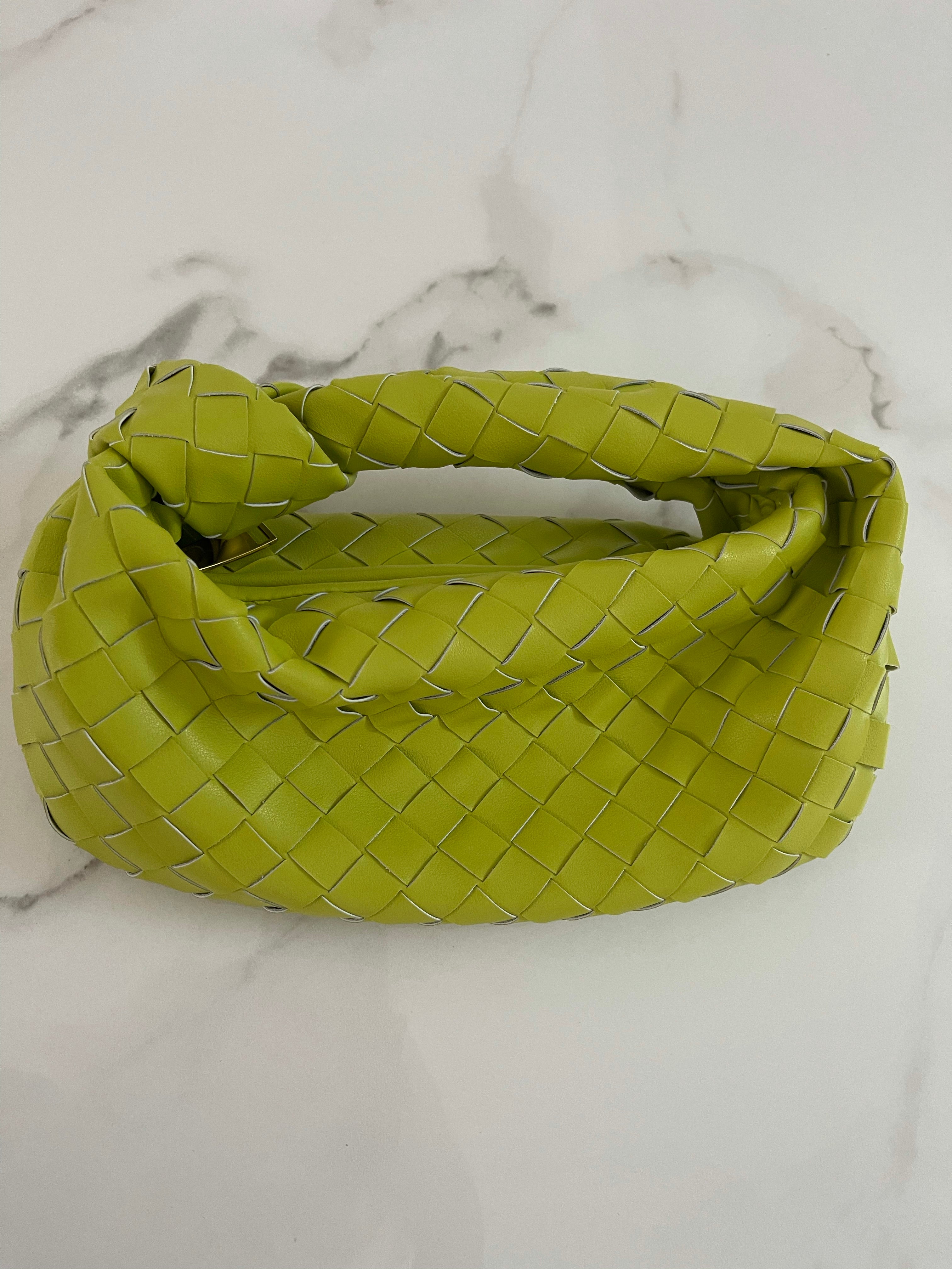 NEW IN WHITNEY fine weave leather Bag.