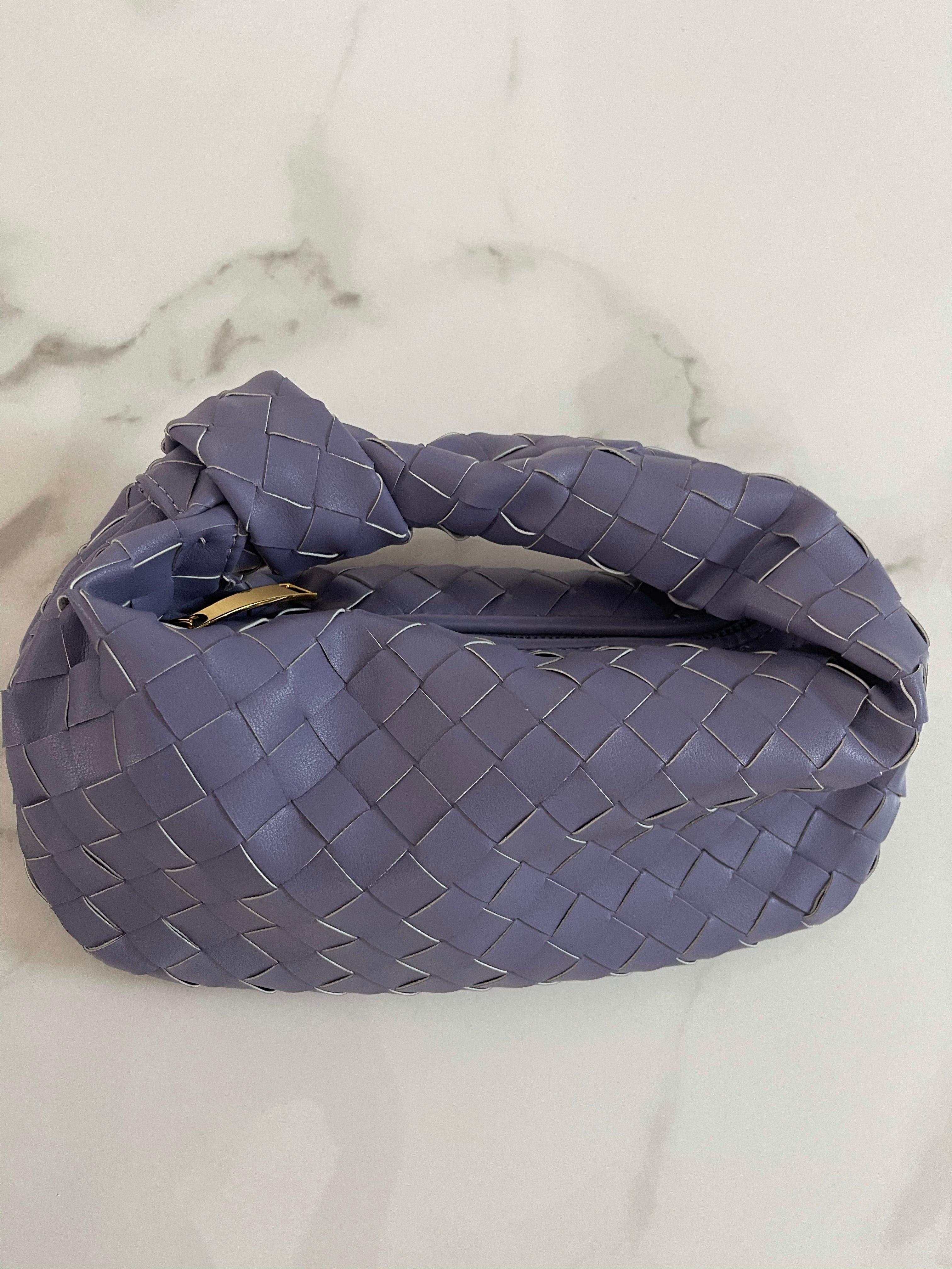 NEW IN WHITNEY fine weave leather Bag.