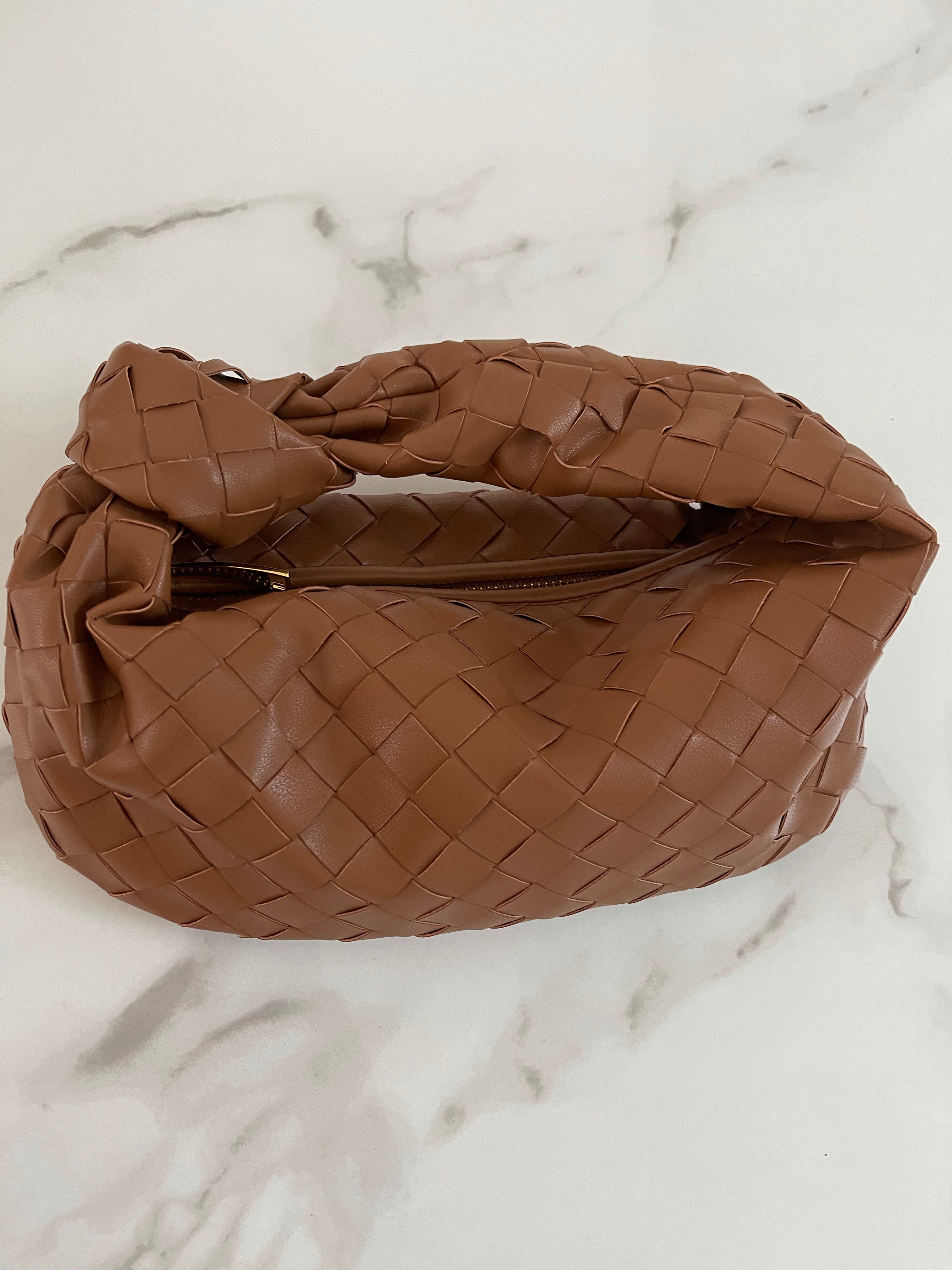 NEW IN WHITNEY fine weave leather Bag.